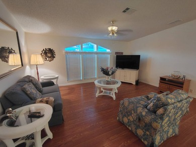 Welcome to this 3-bedroom 2-bath oasis!!! Lot Rent includes all on Spanish Lakes Fairways in Florida - for sale on GolfHomes.com, golf home, golf lot