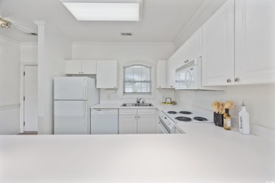 Experience the best of coastal living in this gorgeous top-floor on Myrtlewood Golf Course and Club  in South Carolina - for sale on GolfHomes.com, golf home, golf lot