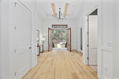 Welcome to this stunning 5-bedroom, 4.5-bath home in the heart on Willbrook Plantation in South Carolina - for sale on GolfHomes.com, golf home, golf lot