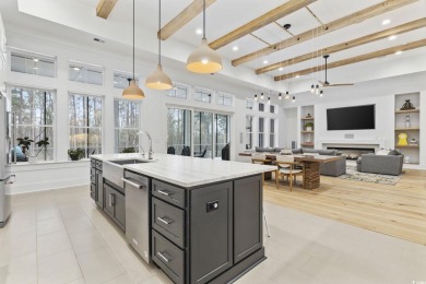 Welcome to this stunning 5-bedroom, 4.5-bath home in the heart on Willbrook Plantation in South Carolina - for sale on GolfHomes.com, golf home, golf lot