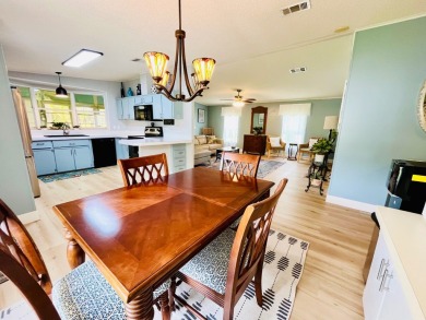 Spacious 2 bed, 2 bath home with open floor plan.Large master on Pine Lakes Country Club in Florida - for sale on GolfHomes.com, golf home, golf lot
