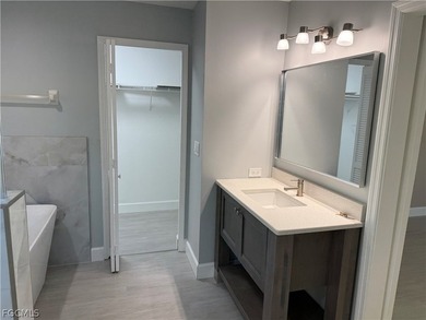 Spacious 3 bedroom 2 bath pool home in CAPE ROYAL, a gated golf on Royal Tee Country Club in Florida - for sale on GolfHomes.com, golf home, golf lot