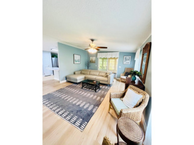 Spacious 2 bed, 2 bath home with open floor plan.Large master on Pine Lakes Country Club in Florida - for sale on GolfHomes.com, golf home, golf lot