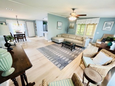Spacious 2 bed, 2 bath home with open floor plan.Large master on Pine Lakes Country Club in Florida - for sale on GolfHomes.com, golf home, golf lot