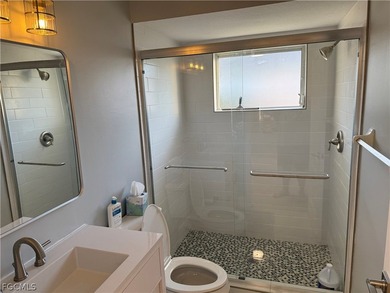 Spacious 3 bedroom 2 bath pool home in CAPE ROYAL, a gated golf on Royal Tee Country Club in Florida - for sale on GolfHomes.com, golf home, golf lot