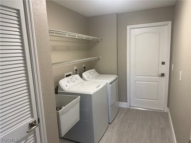 Spacious 3 bedroom 2 bath pool home in CAPE ROYAL, a gated golf on Royal Tee Country Club in Florida - for sale on GolfHomes.com, golf home, golf lot