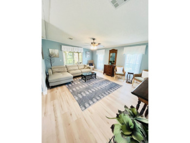 Spacious 2 bed, 2 bath home with open floor plan.Large master on Pine Lakes Country Club in Florida - for sale on GolfHomes.com, golf home, golf lot