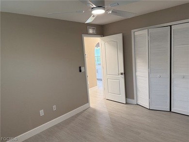 Spacious 3 bedroom 2 bath pool home in CAPE ROYAL, a gated golf on Royal Tee Country Club in Florida - for sale on GolfHomes.com, golf home, golf lot