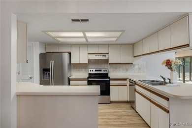 Don't miss this exceptional two-bedroom, two-bath extra-large on Sugarmill Woods Golf and Country Club in Florida - for sale on GolfHomes.com, golf home, golf lot