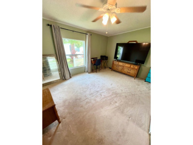 Spacious 2 bed, 2 bath home with open floor plan.Large master on Pine Lakes Country Club in Florida - for sale on GolfHomes.com, golf home, golf lot