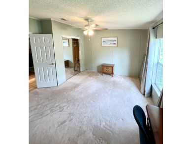 Spacious 2 bed, 2 bath home with open floor plan.Large master on Pine Lakes Country Club in Florida - for sale on GolfHomes.com, golf home, golf lot