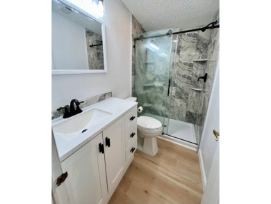 Spacious 2 bed, 2 bath home with open floor plan.Large master on Pine Lakes Country Club in Florida - for sale on GolfHomes.com, golf home, golf lot