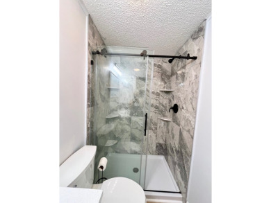 Spacious 2 bed, 2 bath home with open floor plan.Large master on Pine Lakes Country Club in Florida - for sale on GolfHomes.com, golf home, golf lot