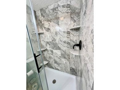 Spacious 2 bed, 2 bath home with open floor plan.Large master on Pine Lakes Country Club in Florida - for sale on GolfHomes.com, golf home, golf lot