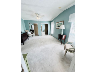 Spacious 2 bed, 2 bath home with open floor plan.Large master on Pine Lakes Country Club in Florida - for sale on GolfHomes.com, golf home, golf lot