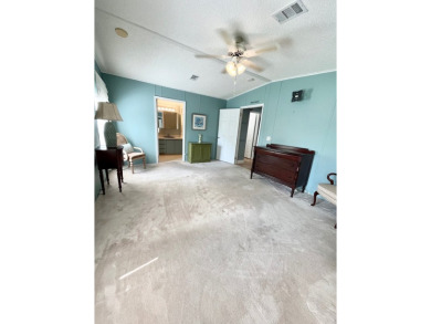 Spacious 2 bed, 2 bath home with open floor plan.Large master on Pine Lakes Country Club in Florida - for sale on GolfHomes.com, golf home, golf lot