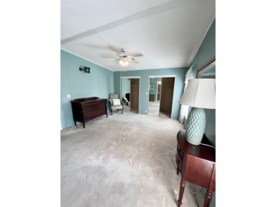 Spacious 2 bed, 2 bath home with open floor plan.Large master on Pine Lakes Country Club in Florida - for sale on GolfHomes.com, golf home, golf lot