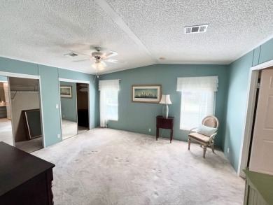 Spacious 2 bed, 2 bath home with open floor plan.Large master on Pine Lakes Country Club in Florida - for sale on GolfHomes.com, golf home, golf lot