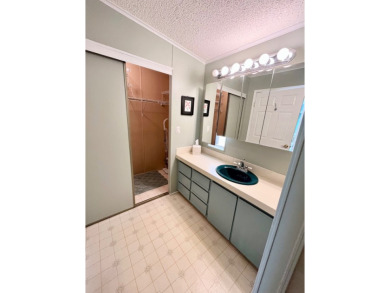 Spacious 2 bed, 2 bath home with open floor plan.Large master on Pine Lakes Country Club in Florida - for sale on GolfHomes.com, golf home, golf lot