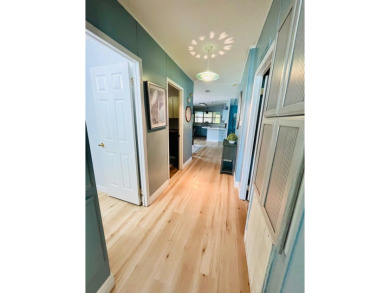 Spacious 2 bed, 2 bath home with open floor plan.Large master on Pine Lakes Country Club in Florida - for sale on GolfHomes.com, golf home, golf lot