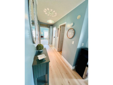 Spacious 2 bed, 2 bath home with open floor plan.Large master on Pine Lakes Country Club in Florida - for sale on GolfHomes.com, golf home, golf lot