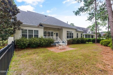 Presenting this custom-built 4-bedroom, 3-bathroom home in the on Sea Trail Golf Resort in North Carolina - for sale on GolfHomes.com, golf home, golf lot