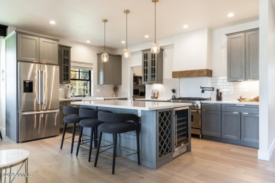 A one of a kind, nearly new residence located in the highly on Eagle Ranch in Colorado - for sale on GolfHomes.com, golf home, golf lot