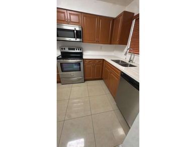 Beautiful 2BR/2BA Condo in 55+ Gated Community with Garden Views on Inverrary Country Club in Florida - for sale on GolfHomes.com, golf home, golf lot