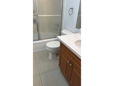 Beautiful 2BR/2BA Condo in 55+ Gated Community with Garden Views on Inverrary Country Club in Florida - for sale on GolfHomes.com, golf home, golf lot