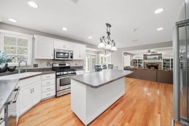 This stunning Seven Bridges Estate Home is located on a peaceful on Seven Bridges Golf Club in Illinois - for sale on GolfHomes.com, golf home, golf lot