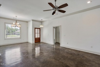 Looking for a a beautiful open plan 3/2 home with great curb on Castlewoods Golf Club in Mississippi - for sale on GolfHomes.com, golf home, golf lot