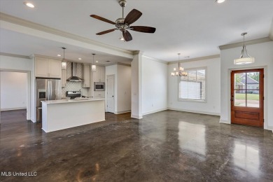 Looking for a a beautiful open plan 3/2 home with great curb on Castlewoods Golf Club in Mississippi - for sale on GolfHomes.com, golf home, golf lot