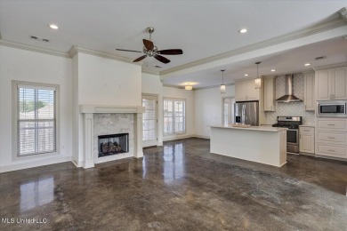 Looking for a a beautiful open plan 3/2 home with great curb on Castlewoods Golf Club in Mississippi - for sale on GolfHomes.com, golf home, golf lot