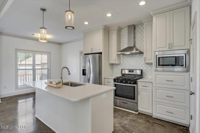 Looking for a a beautiful open plan 3/2 home with great curb on Castlewoods Golf Club in Mississippi - for sale on GolfHomes.com, golf home, golf lot