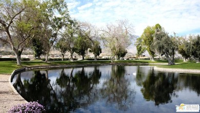 This updated 1972 Silvercrest 2-bed,2-bath 1440 sq ft home plus on Date Palm Country Club in California - for sale on GolfHomes.com, golf home, golf lot