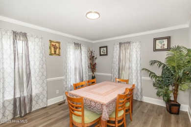 Situated alongside the Wilson Country Club golf course, this on Wilson Country Club in North Carolina - for sale on GolfHomes.com, golf home, golf lot