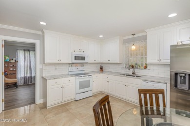 Situated alongside the Wilson Country Club golf course, this on Wilson Country Club in North Carolina - for sale on GolfHomes.com, golf home, golf lot