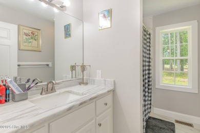 Situated alongside the Wilson Country Club golf course, this on Wilson Country Club in North Carolina - for sale on GolfHomes.com, golf home, golf lot