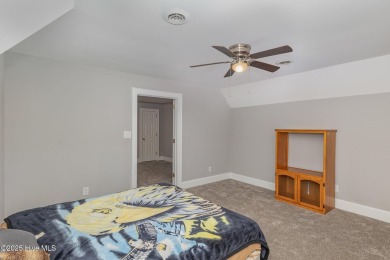 Situated alongside the Wilson Country Club golf course, this on Wilson Country Club in North Carolina - for sale on GolfHomes.com, golf home, golf lot