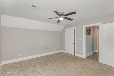 Situated alongside the Wilson Country Club golf course, this on Wilson Country Club in North Carolina - for sale on GolfHomes.com, golf home, golf lot