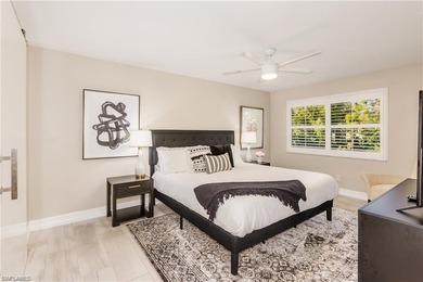 Discover this beautifully remodeled upstairs condo in the heart on The Glades Golf and Country Club in Florida - for sale on GolfHomes.com, golf home, golf lot