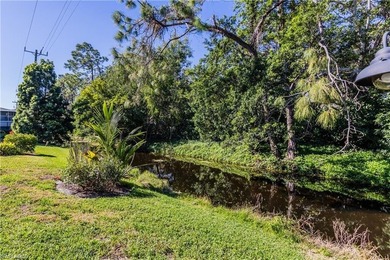 Discover this beautifully remodeled upstairs condo in the heart on The Glades Golf and Country Club in Florida - for sale on GolfHomes.com, golf home, golf lot