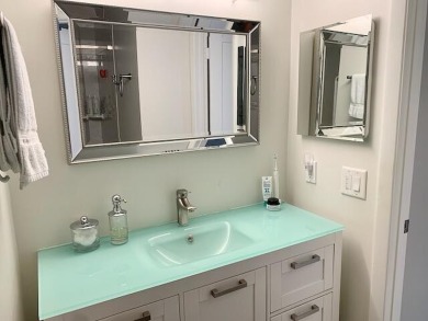 Beautifully renovated home with an amazing lake and golf view in on The Country Club At Boca Raton in Florida - for sale on GolfHomes.com, golf home, golf lot