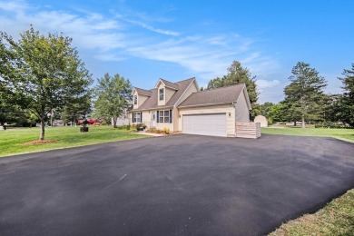 Discover a perfect blend of comfort, community,  convenience on Hankerd Hills Golf Course in Michigan - for sale on GolfHomes.com, golf home, golf lot
