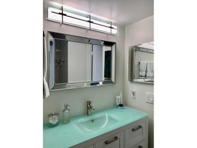 Beautifully renovated home with an amazing lake and golf view in on The Country Club At Boca Raton in Florida - for sale on GolfHomes.com, golf home, golf lot