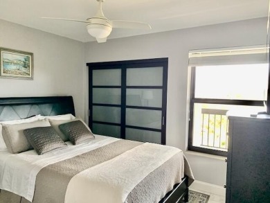 Beautifully renovated home with an amazing lake and golf view in on The Country Club At Boca Raton in Florida - for sale on GolfHomes.com, golf home, golf lot