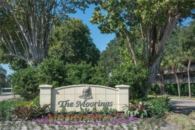 Ease and simplicity within the coveted setting of the Moorings on The Moorings Country Club in Florida - for sale on GolfHomes.com, golf home, golf lot