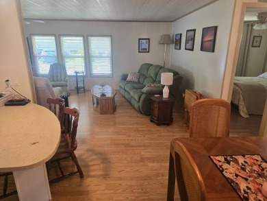 TWO DRIVEWAYS PROVIDE ADDITIONAL PARKING - NICE CORNER LOT - on Grasslands Golf and Country Club in Florida - for sale on GolfHomes.com, golf home, golf lot