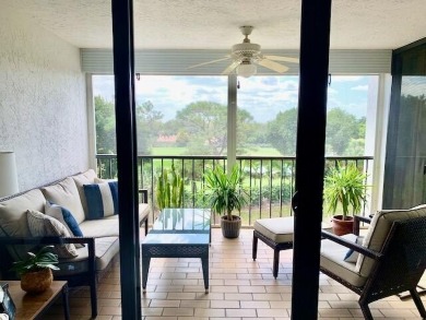 Beautifully renovated home with an amazing lake and golf view in on The Country Club At Boca Raton in Florida - for sale on GolfHomes.com, golf home, golf lot