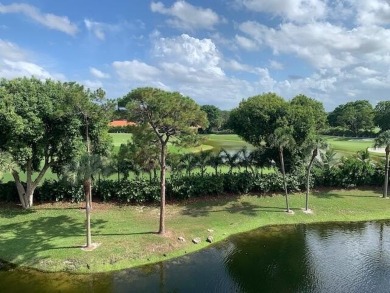 Beautifully renovated home with an amazing lake and golf view in on The Country Club At Boca Raton in Florida - for sale on GolfHomes.com, golf home, golf lot